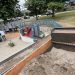 Astoria Parks & Recreation replenishes sandbox at Tapiola Park